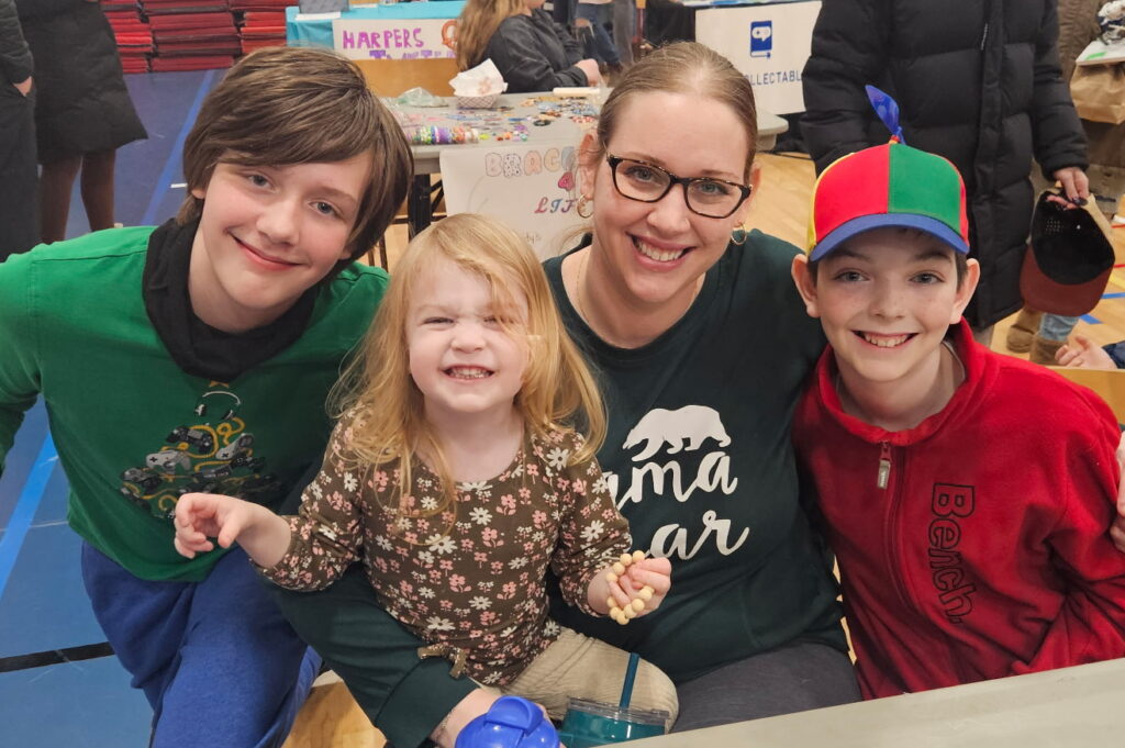 Two boys and two girls at a public school gym